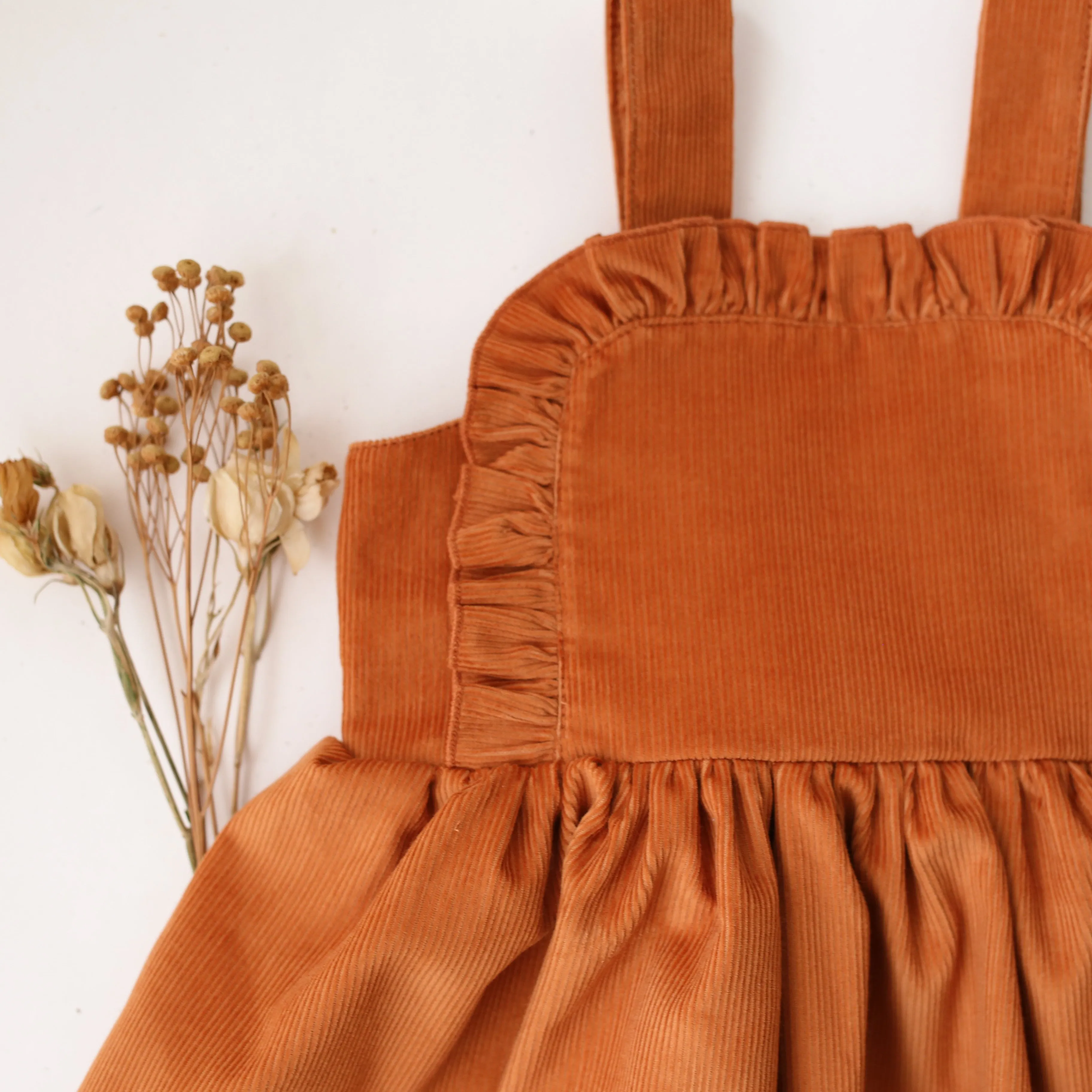 Ochre Corduroy Ruffle Bib Pinafore Dress